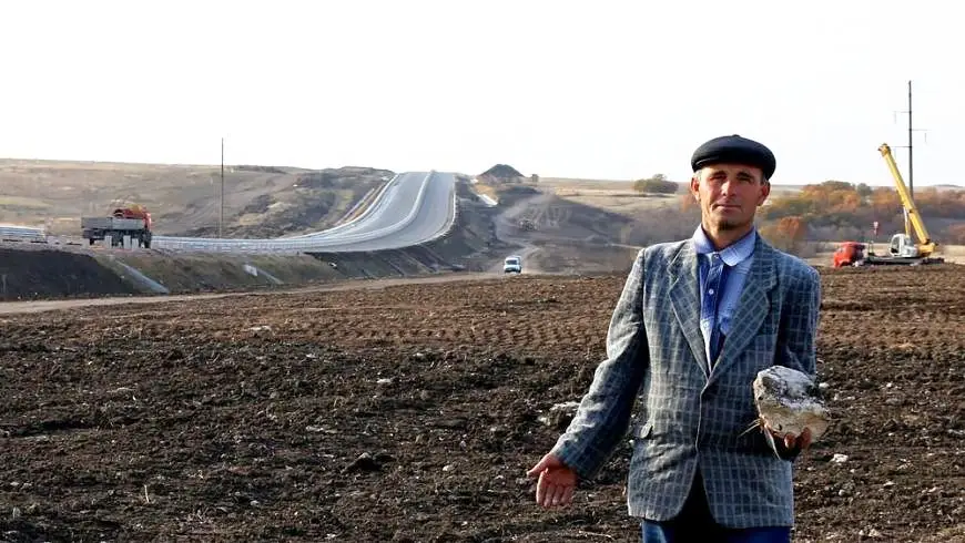 селянин с землей